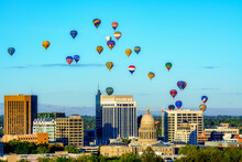 Beautiful Colorful Hot Air Balloons Liftoff Over The Boise Skyline