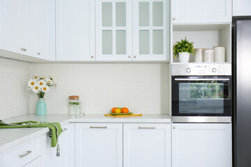 Sticker - Modern kitchen interior with stylish white furniture