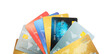 © New Africa - Different credit cards on white background, closeup