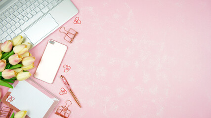 Wall Mural - Feminine pink theme desktop workspace with laptop on stylish textured background. Top view blog hero header creative composition flat lay.