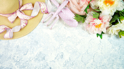 Wall Mural - Spring theme, peonies and sunhat desktop workspace with gardening tools on stylish white marble textured background. Top view blog hero header creative composition flat lay.