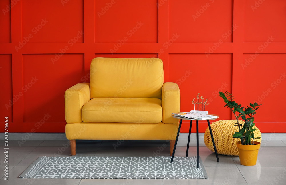 Modern armchair in interior of room