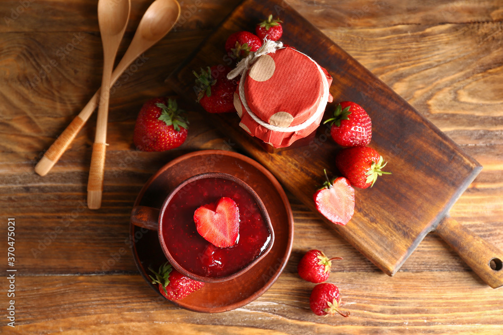 Sweet strawberry jam on table - obrazy, fototapety, plakaty 