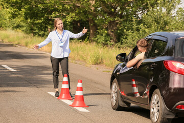 Canvas Print - Instructor conducting driver licence test