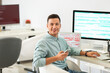 © Pixel-Shot - Portrait of male programmer in office