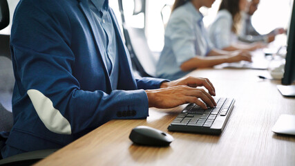 Close up of hands contemporary website developer man typing and writing code for program