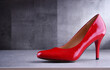 © monticellllo - Composition with a red high heel shoe