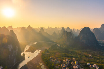 Sunlight over the beautiful karst landscape of Xingping, Guilin, China