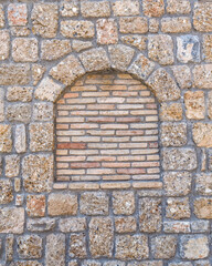 stonewall with arch frame shape and brickwork, textured pattern background