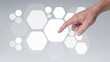 © SEVENNINE_79 - The man shows the gesture of pointing touching on the virtual screen and has a beehive screen effect.  Investment ideas, business concepts, technology concepts