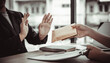 © Puwasit Inyavileart - Company employee denies the bribery of a young man.