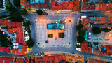 Fototapeta Miasto - Sandomierz Market Square and City Hall Illuminated at Morning. Aerial Drone View