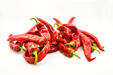 Red hot chili peppers on a white background.