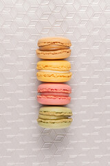 Canvas Print - Four macaroons on white vinyl background