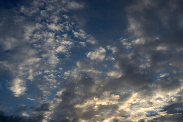 Wall Mural - Clouds at sunset.