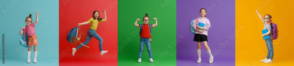 Kids with backpacks on colorful background - obrazy, fototapety, plakaty 