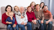 © JackF - Family members making family photo during reunion party on sofa