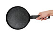 © TWINS DESIGN STUDIO - Hand holding a pan isolated on white background.