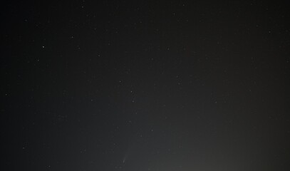 Wall Mural - widefield astronomical image showing comet neowise and the skies in the region of ursa major