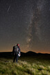 © Xalanx - Man hiking at night under starry sky