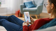 © Gorodenkoff - Young Girl Sick at Home Using Smartphone to Talk to Her Doctor via Video Conference Medical App. Woman Checks Possible Symptoms with Professional Physician, Using Online Video Chat Application