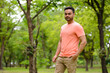 © Ranta Images - Young handsome bearded Indian man at the park