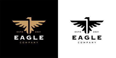 Wall Mural - Eagle crest logo icon template design. Concept gold bird insignia business emblem. Premium company brand identity hawk symbol. Heraldic falcon in flight badge. Vector illustration.