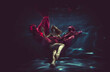 © oneinchpunch - Beautiful woman swimming with fancy dress underwater
