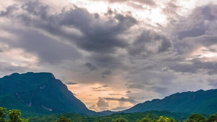 Wall Mural - beautiful mountain view cloudy sky before sunset, nature landscape outdoor travel. 4k time-lapse foo