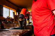 © Alberto Menendez/ADDICTIVE STOCK - Unrecognizable male carpenter standing at workbench and drying piece of wood with professional heat gun