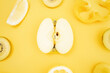 © Gustavo Pozo/ADDICTIVE STOCK - Top view of various fresh fruits and vegetables arranged on yellow background