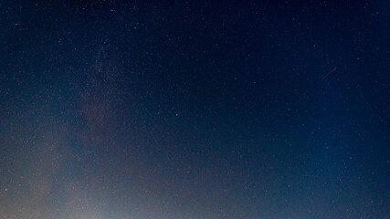 the starry night sky. the milky way and the bright meteorite. a starry landscape.