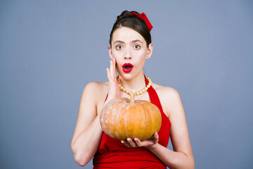 Halloweens woman with pumpkin. Halloween party. Halloween and autumn holidays. Happy beautiful woman with pumpkin. Girl with halloween pumpkin.