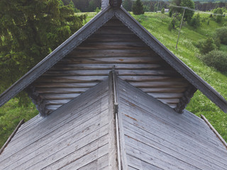 Wall Mural - Roof of an old wooden house. traditional architecture