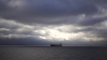 Canvas Print - Seascape with ships on the horizon.