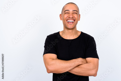 Fotomural Portrait of happy handsome multi ethnic bald man