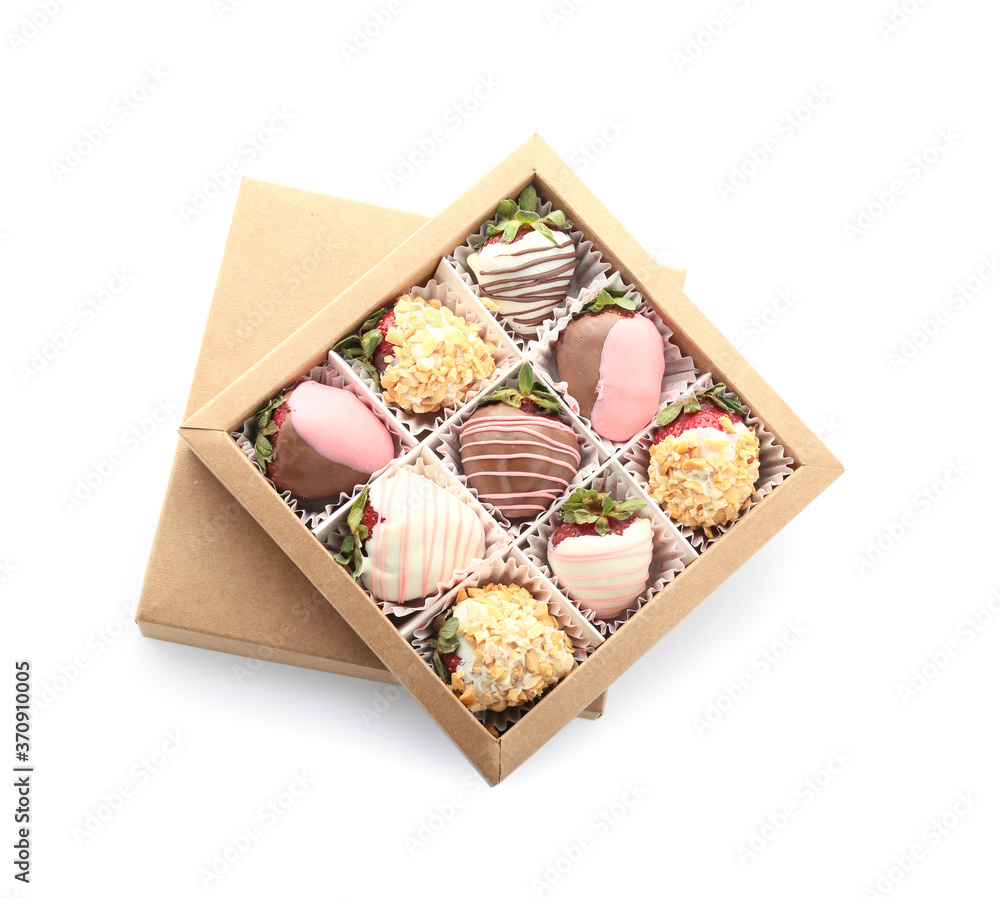 Box with tasty glazed strawberry on white background