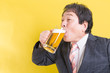 © Paylessimages - ビールを飲むビジネスマン