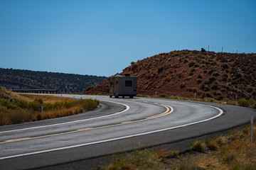 Wall Mural - Natural american landscape with asphalt road to horizon.