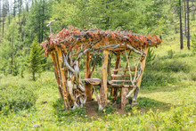 Ecological Arbor Made Of Tree Trunks In The Altai Mountains