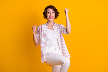 Sticker - Photo of lovely funny pretty student girl raise fists open mouth excited triumphant win strike weekend bowling game friends wear white striped shirt isolated yellow bright color background