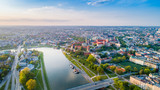 Kraków podczas zachodu słońca nad Wisłą i ICE Kraków Center. Cracow during sunset over the Vistula River and ICE Cracow Centre . 