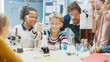 © Gorodenkoff - Elementary School Science Classroom: Little Boy Mixes Chemicals in Beakers. Enthusiastic Teacher Explains Chemistry to Diverse Group of Children. Children Learn with Interest