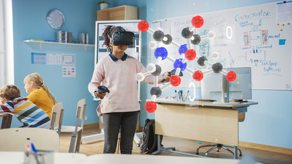 Wall Mural - cute girl wearing augmented reality headset and using controllers interacts with 3d molecule. futuri