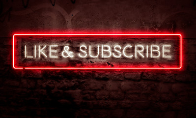 Like And Subscribe Graphic Neon Sign On Brick Wall For Social Media Videos