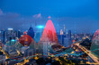 © VideoFlow - FOREX graph hologram, aerial night panoramic cityscape of Kuala Lumpur. KL is the developed location for stock market researchers in Malaysia, Asia. The concept of fundamental analysis.