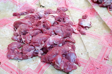 Wall Mural - Fresh red beef is cut into small pieces to celebrate the Muslim holiday, Eid al-Adha