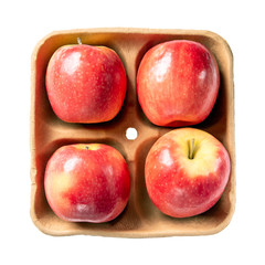 Poster - Red apples on pulp paper food tray isolated on white. Top view.