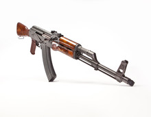 AK-47 With Wood Accessories And Magazine Inserted.
