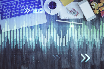 Stock market chart and top view computer on the table background. Multi exposure. Concept of financial analysis.